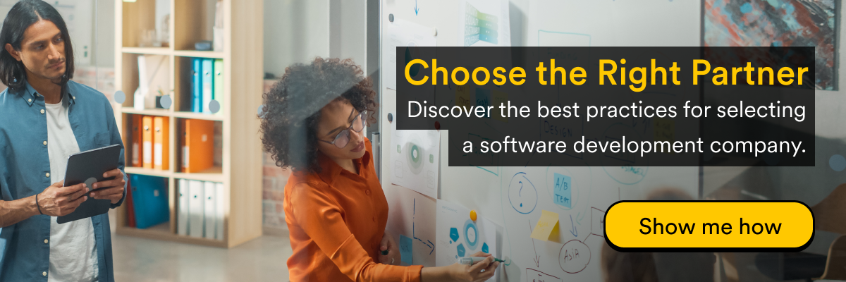Two people evaluating how to choose the right software development company